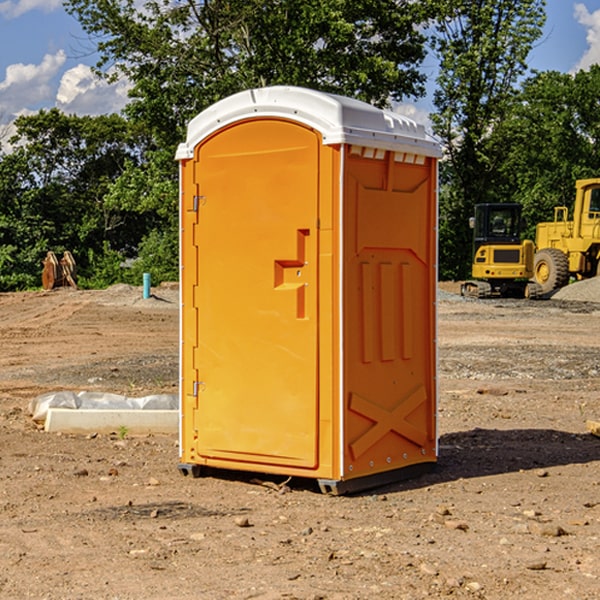 how often are the portable restrooms cleaned and serviced during a rental period in Hawkins